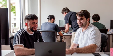Two engineers pairing on a build