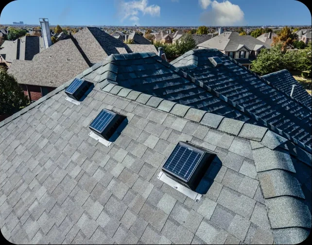 Two 4SEASONS solar vents on a suburban roof