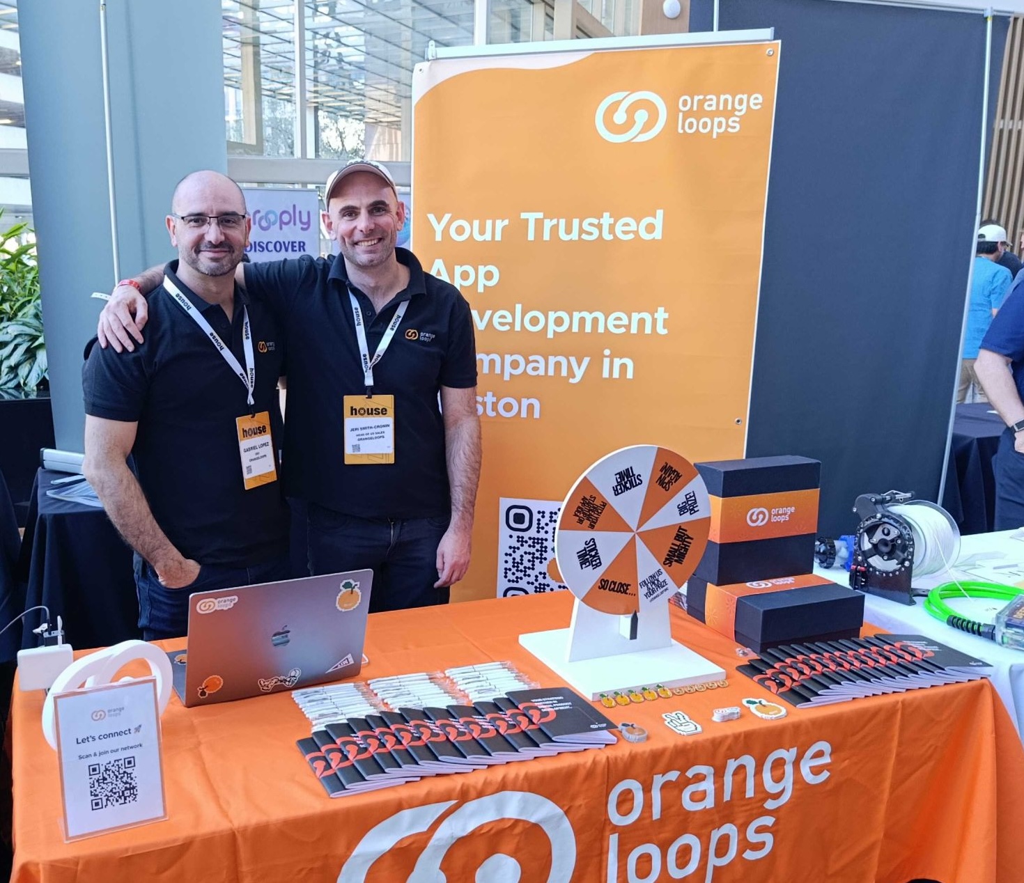 OrangeLoops at a startup crawl event with the team booth