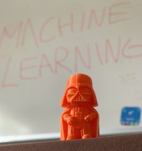 An image of Darth Vader with a whiteboard behind that says "Machine Learning"